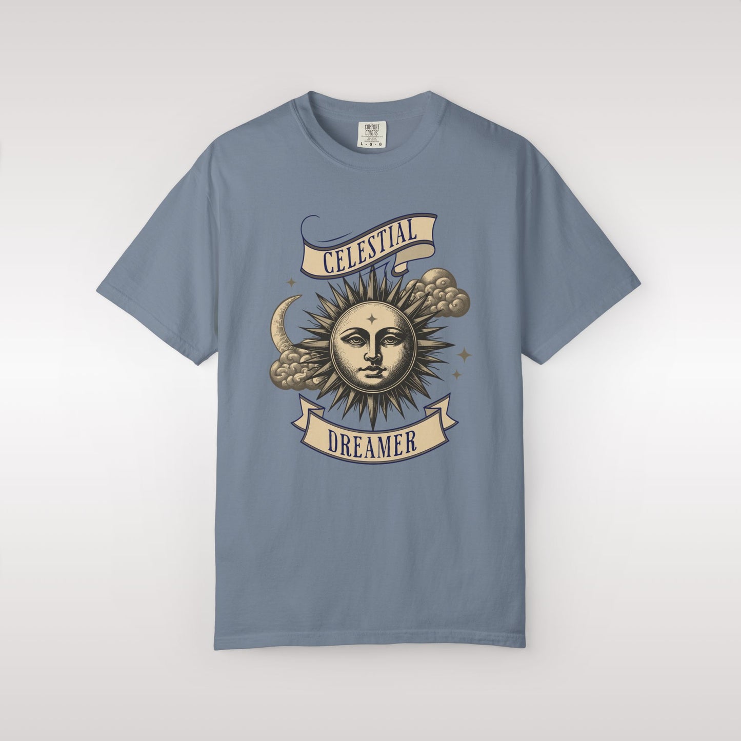 Blue t-shirt with celestial design and 'Celestial Dreamer' text on a white background