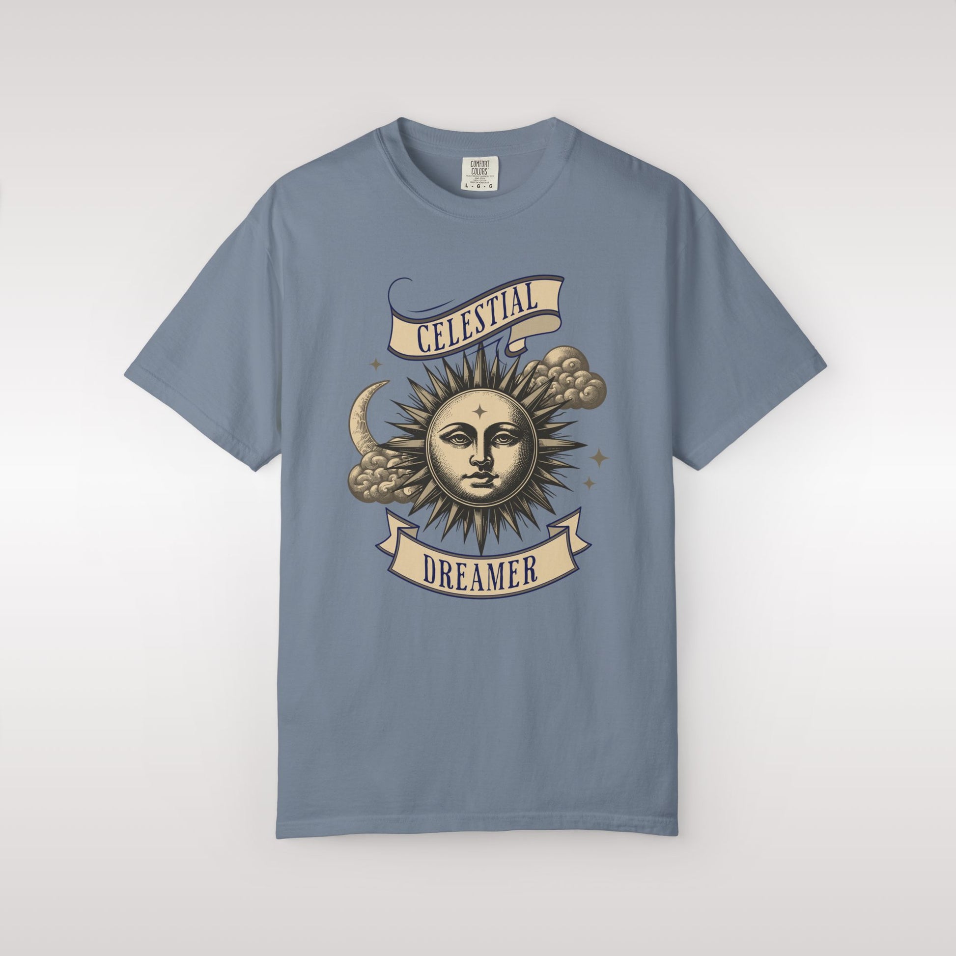 Blue t-shirt with celestial design and 'Celestial Dreamer' text on a white background