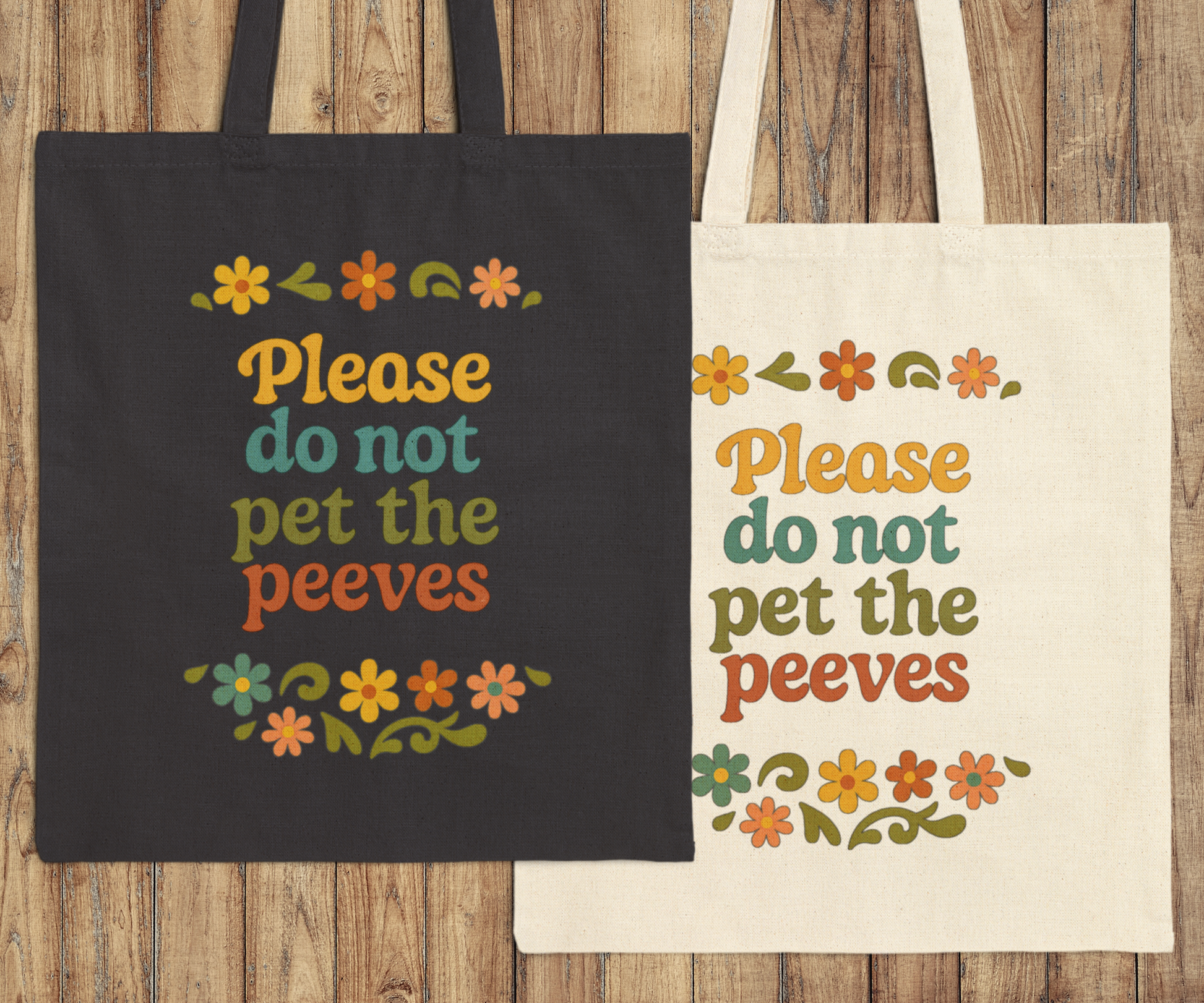 Two tote bags with a humorous text please do not pet the peeves design on a wooden surface